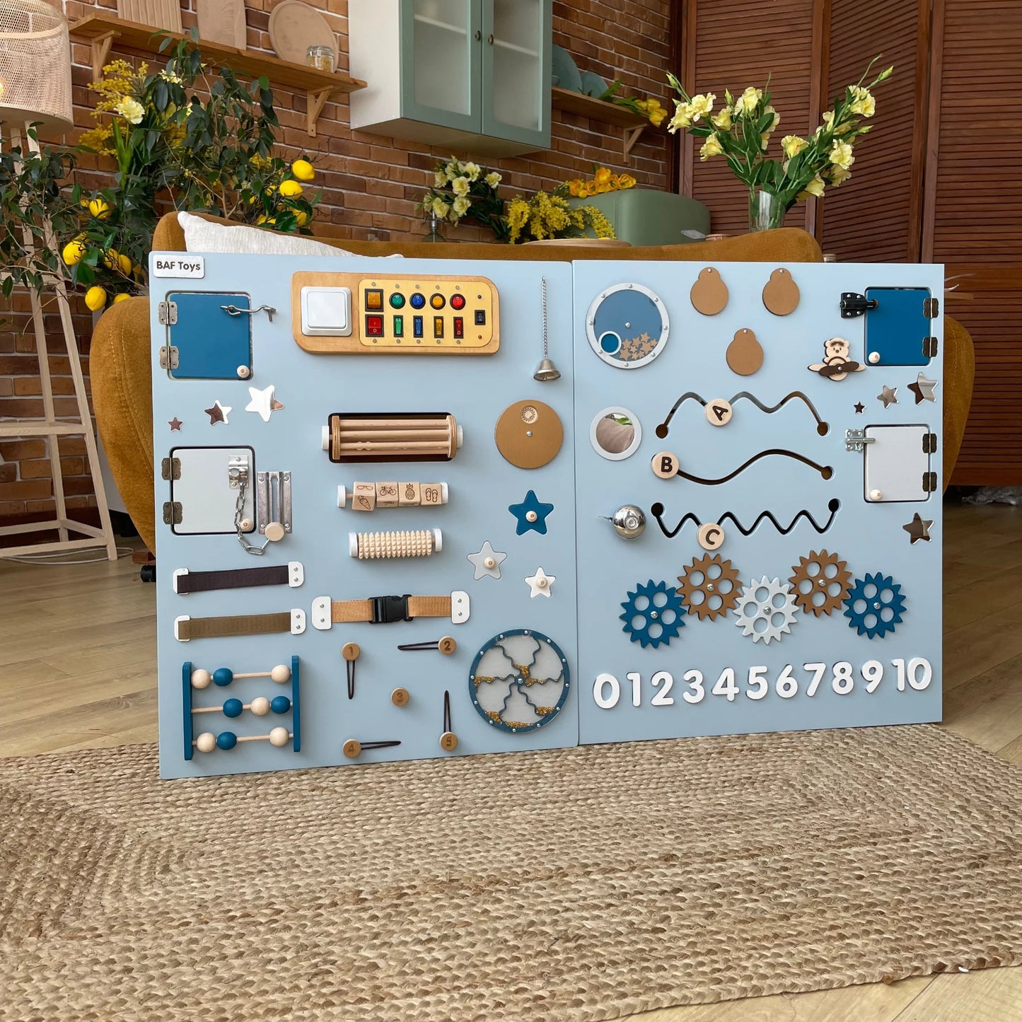 Large blue sensory wall panel with switches, gears, locks, and tactile features. Ideal for autism therapy, fine motor skills, special education, and classroom play areas