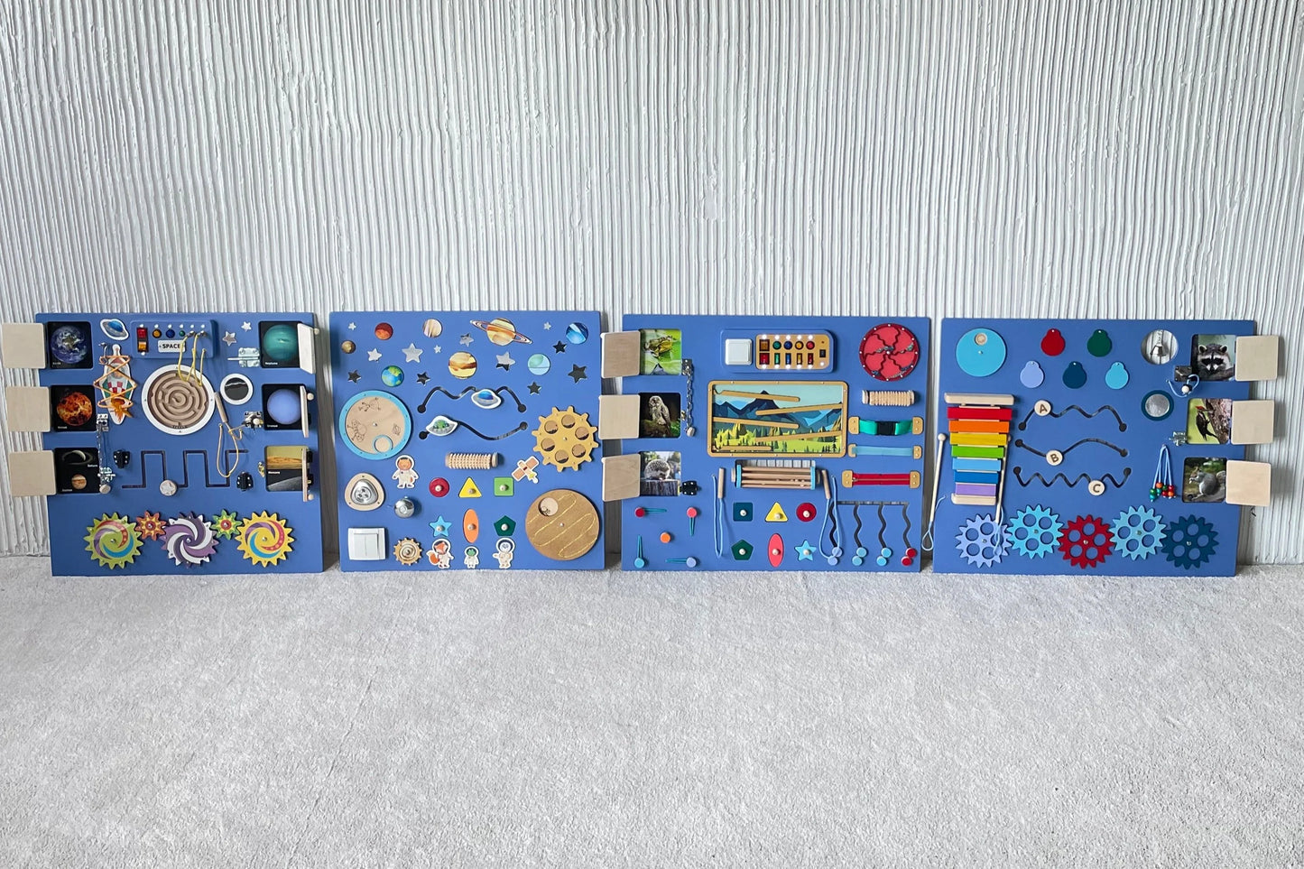 Extra-large purple sensory wall panel with four sections, featuring fine motor activities, LED lights, gears, textures, and visual elements for kids and adults