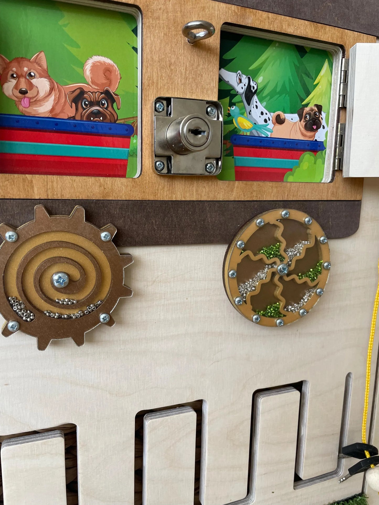 Train theme sensory wall installed in a kindergarten waiting area. Durable sensory equipment for preschool activity.