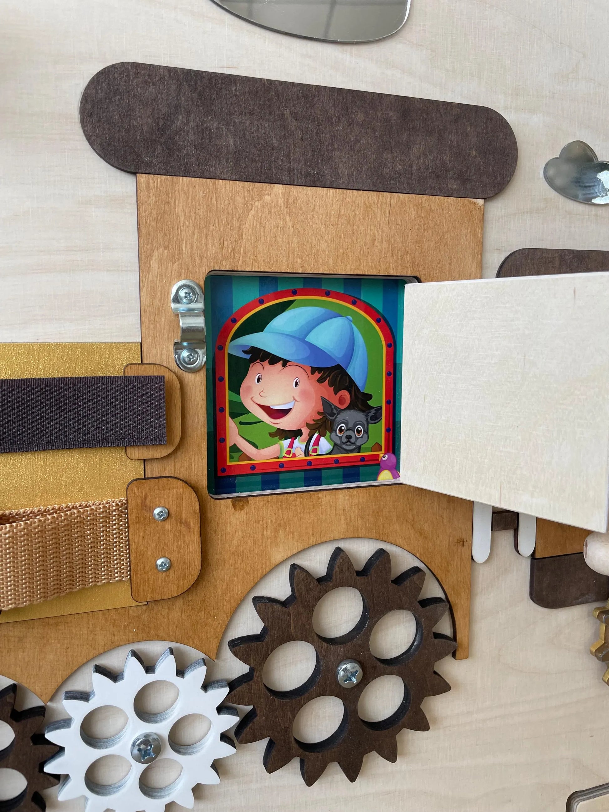 Train theme preschool sensory wall with  lacing activity. Develops cognitive and fine motor skills. 